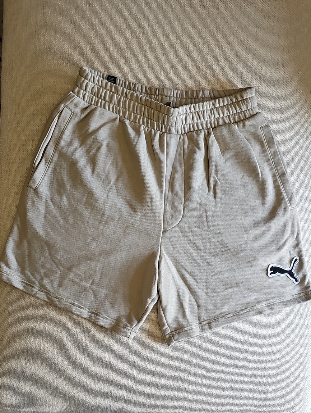 Puma Men's Light Beige Athletic Shorts with Black Logo